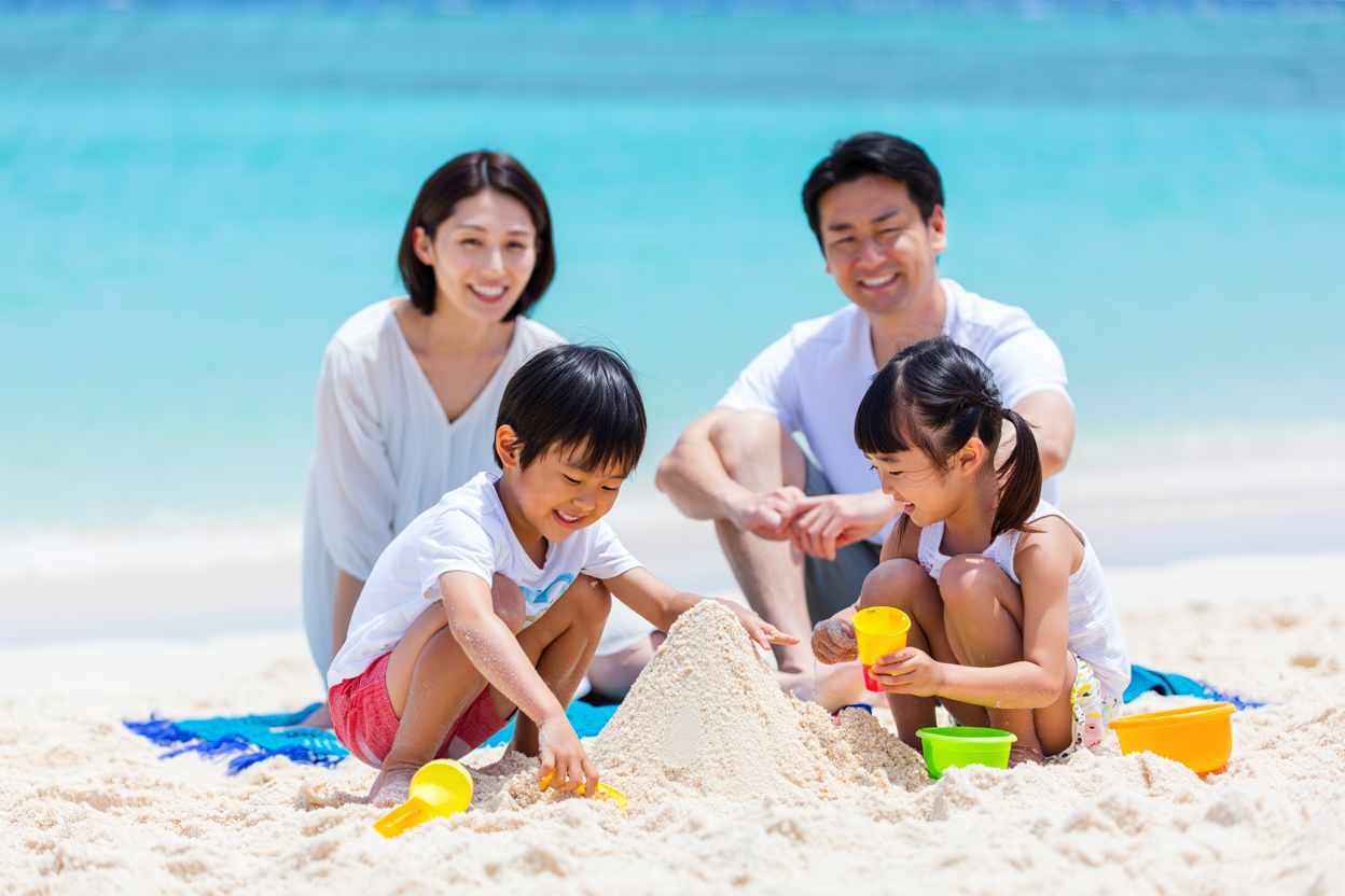 ビーチでカラフルなバケツとかを使い砂遊びしてる子供達